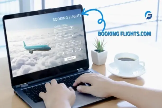 A person books a flight on a laptop. The laptop screen reads, "Booking Flights, Flying From, Flying To, Search, bookingflights.com."